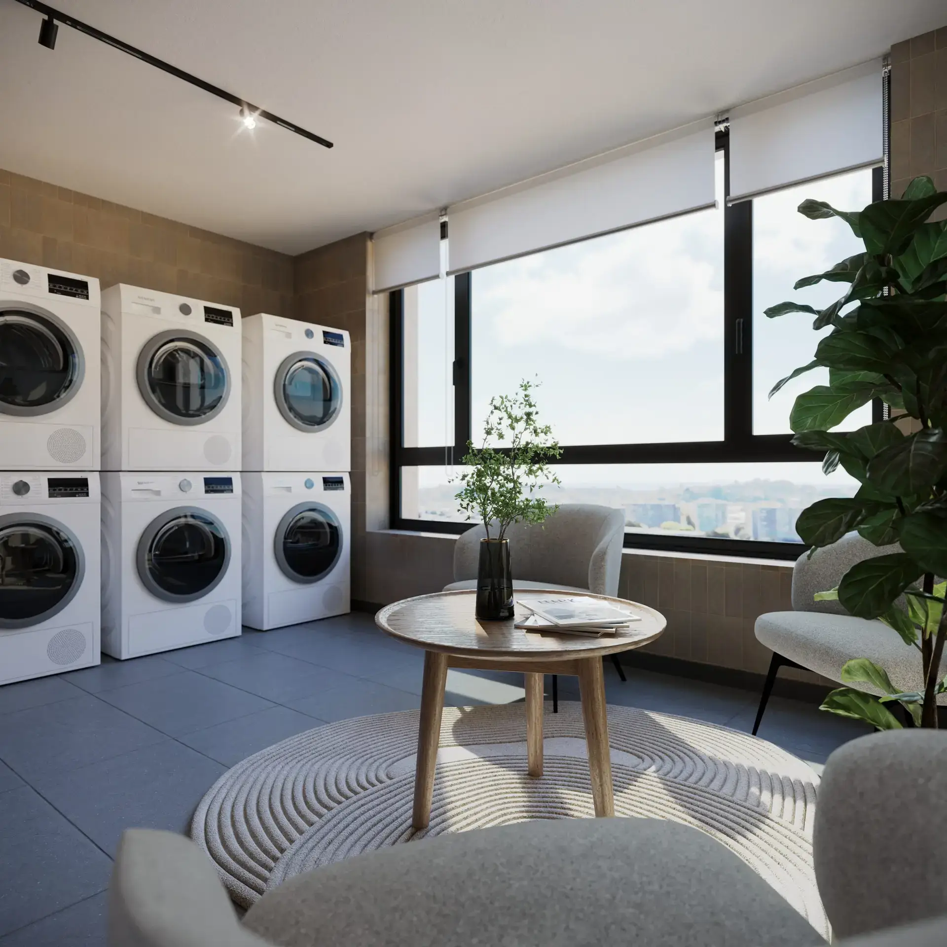 Una lavandería eficiente con vista. Olvídate del estrés de la ropa. Hemos diseñado un espacio práctico, moderno y completamente equipado para optimizar tus tiempos, permitiéndote aprovechar cada minuto libre con la comodidad de estar en tu propio edificio.
